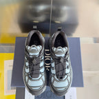 Unisex sneakers with lace-up mesh upper, geometric pattern, chunky sole (front view pair)