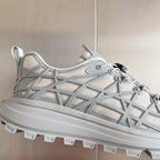 Dior unisex sneaker, white mesh upper with geometric lattice detailing and lace-up front