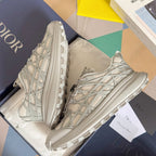 Dior unisex sneakers, white, box view with lattice panels, laces, and thick sole