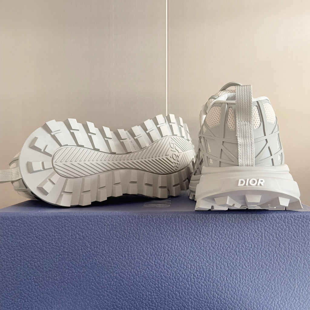 Dior unisex sneakers, white, outsole view with tread pattern and heel logo patch