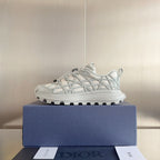 Dior unisex sneaker, white mesh upper with lace-up front and chunky tread sole