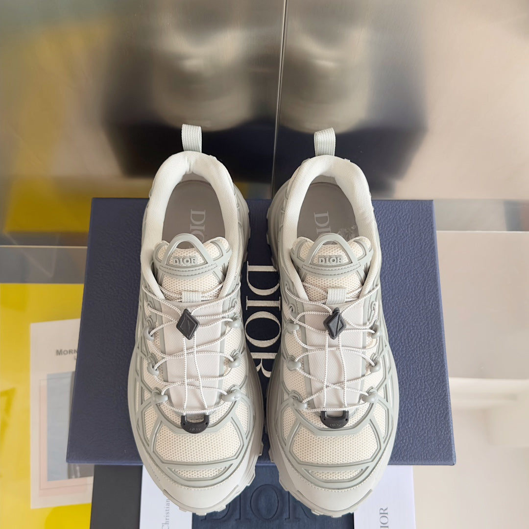 Dior unisex sneakers, white, front view with lace-up mesh and cushioned collar