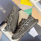 Dior unisex sneakers side and heel view, dark gray with white lattice paneling