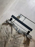 Balenciaga light-wash denim shorts with belt straps and front patch pocket