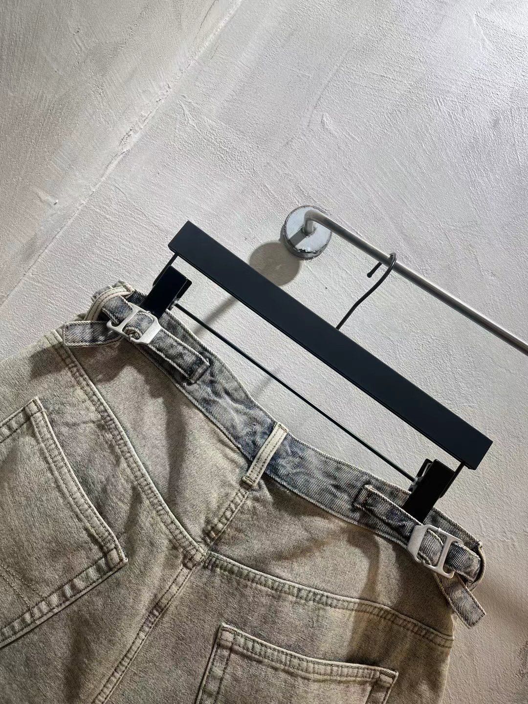Balenciaga light-wash denim shorts with belt straps and front patch pocket