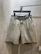 Balenciaga light-wash denim shorts with button fly, belt loops, frayed hem