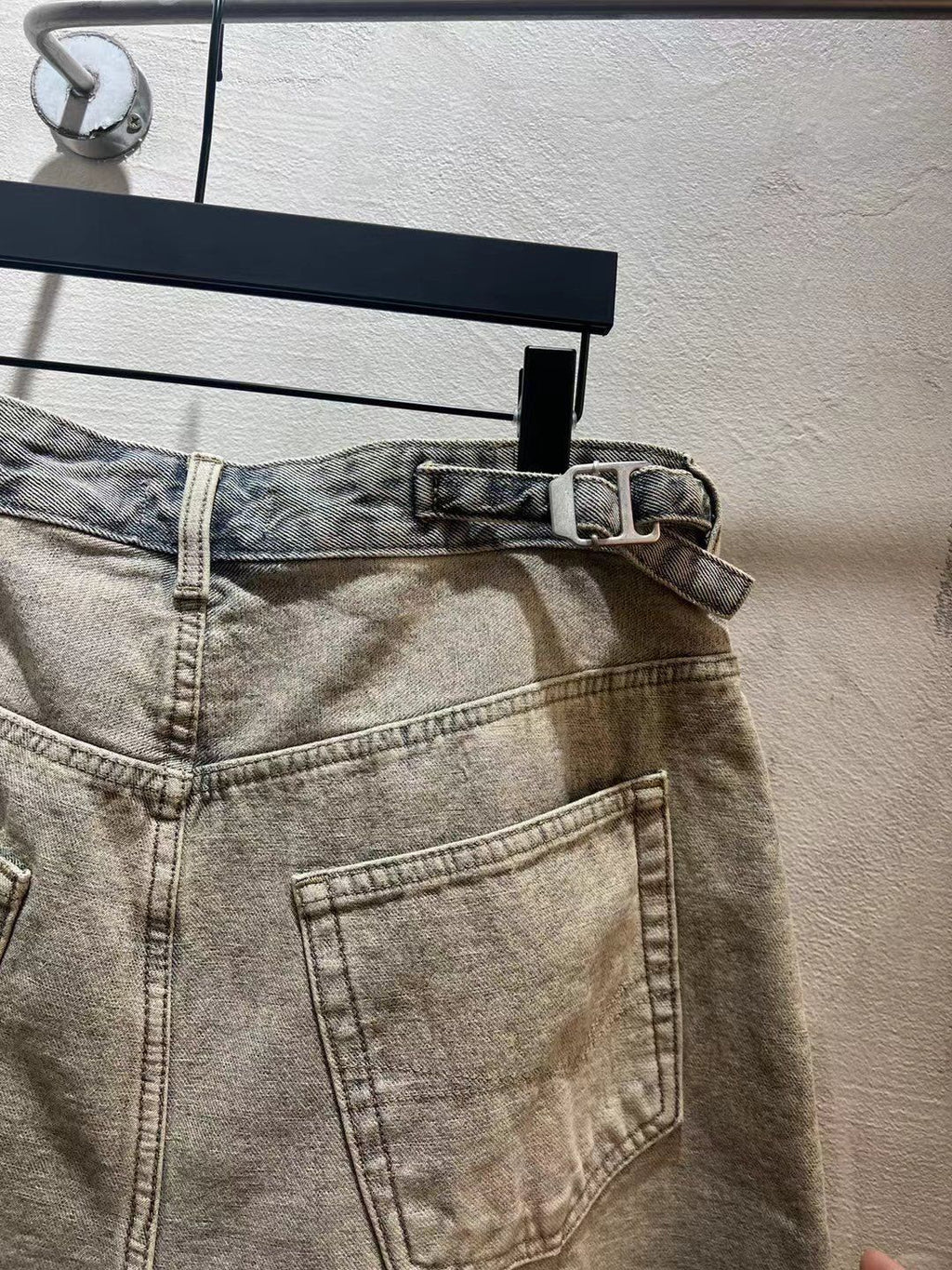 Balenciaga light-wash denim shorts with belt loops, button fly, and front patch pocket