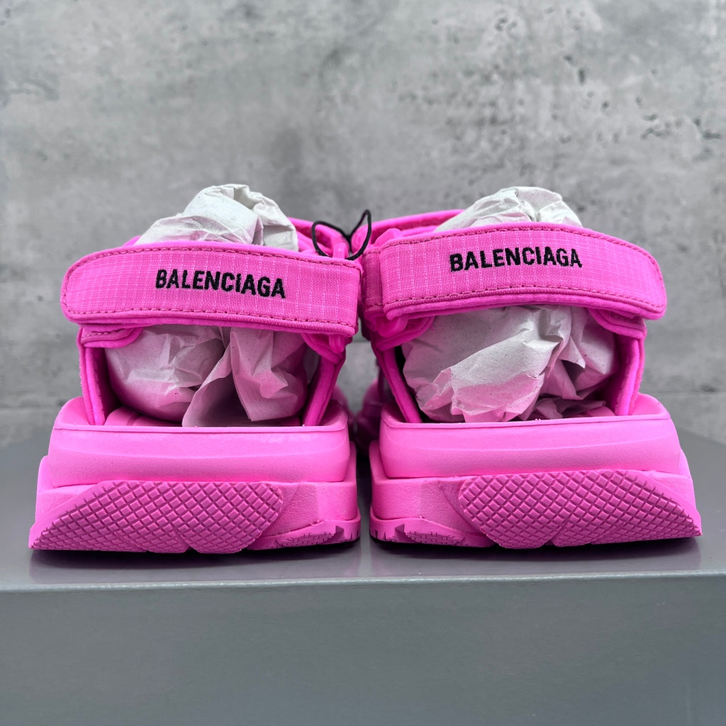 Pink Balenciaga sandals with heel strap and BALENCIAGA logo on the back