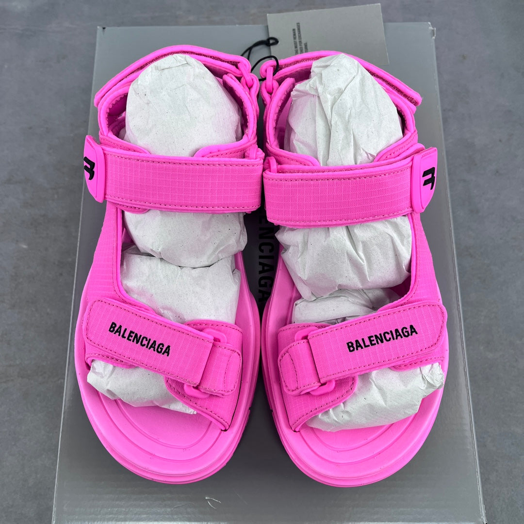 Pink Balenciaga unisex sandals pair with wide straps and chunky platform sole