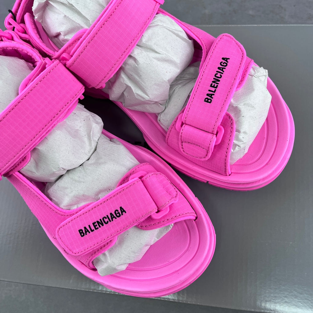 Pink Balenciaga unisex sandals with multiple hook-and-loop straps and chunky sole