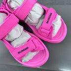 Pink Balenciaga unisex sandals with multiple hook-and-loop straps and chunky sole