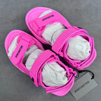 Pink Balenciaga sandals with wide straps and printed BALENCIAGA heel branding