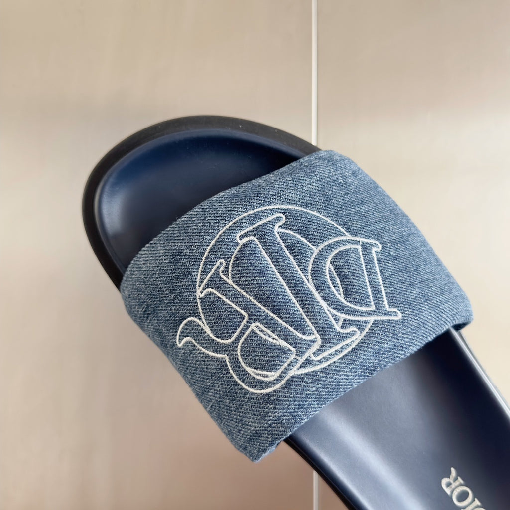 Dior slide sandal with denim strap and white Dior monogram, navy footbed