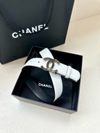 White leather Chanel belt with silver CC buckle and adjustable strap in box