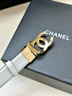 White leather Chanel belt with gold-toned adjustable buckle hardware
