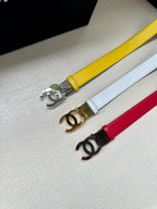Set of three leather belts: yellow, white, and red, each with Chanel logo buckle