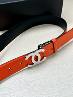 Chanel orange leather belt with large silver CC buckle and metal clasp