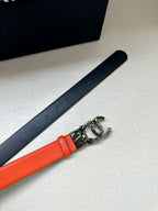 Chanel belt with orange leather center, silver buckle on dark strap
