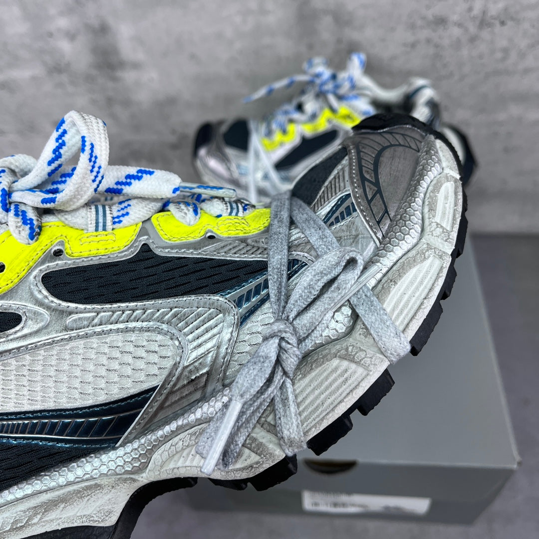 Balenciaga unisex sneaker toe and side, silver texture, black panel, neon yellow detail