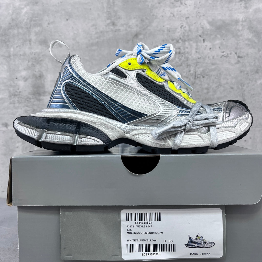 Balenciaga unisex sneakers on box, silver mesh, black panels, neon yellow, blue laces