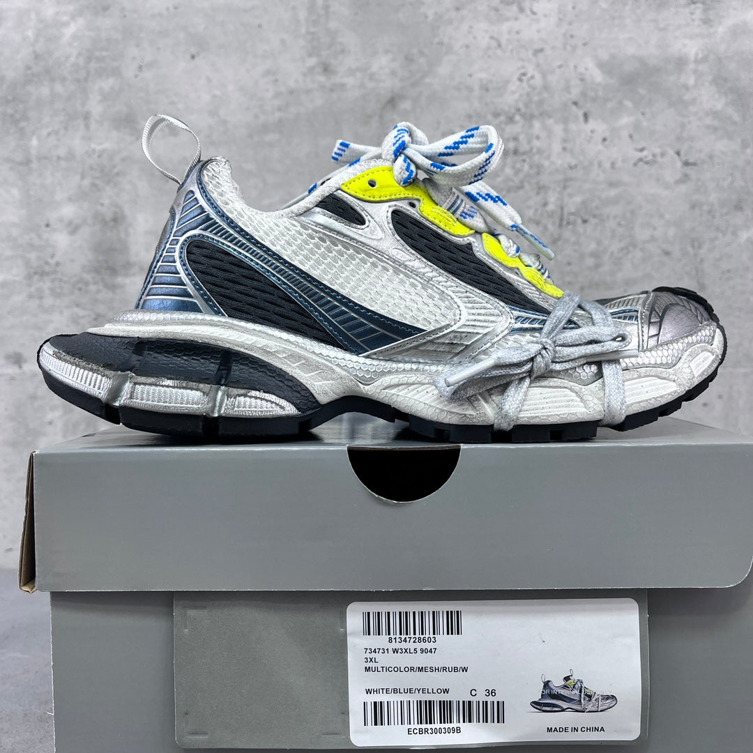 Balenciaga unisex sneakers on box, silver mesh, black panels, neon yellow, blue laces