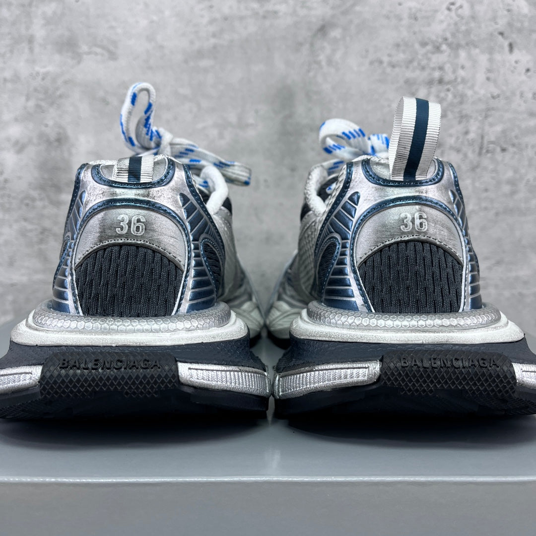Balenciaga unisex sneakers heel view, silver uppers with black mesh and neon yellow accents