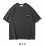 Stone Island crew-neck T-shirt, short sleeves, small chest logo patch, dark gray