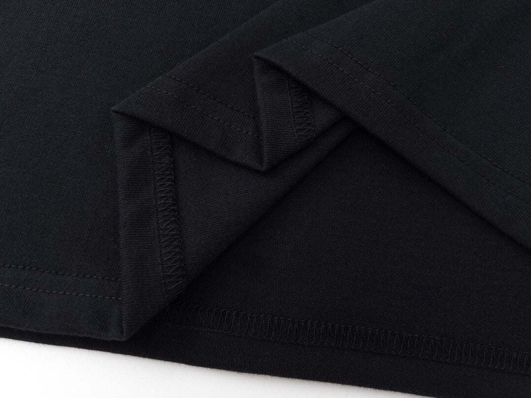 Black sweatshirt sleeve cuff and hem stitching detail