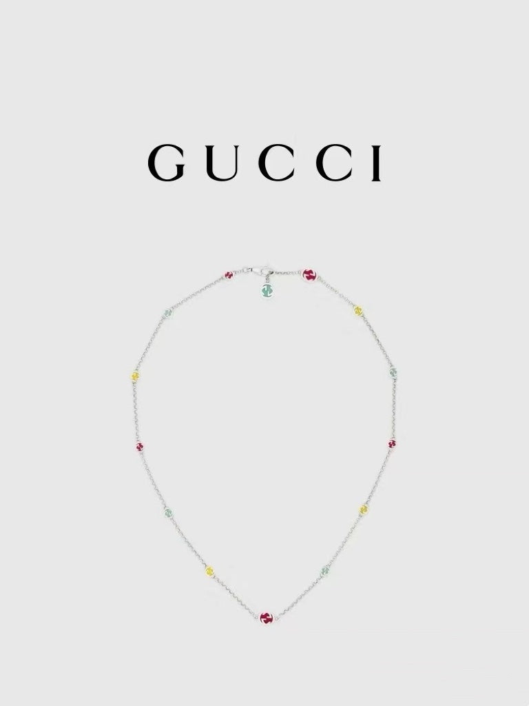 Gucci charm bracelet with silver chain and multicolor enamel bead charms