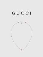 Gucci charm bracelet with silver chain and multicolor enamel bead charms