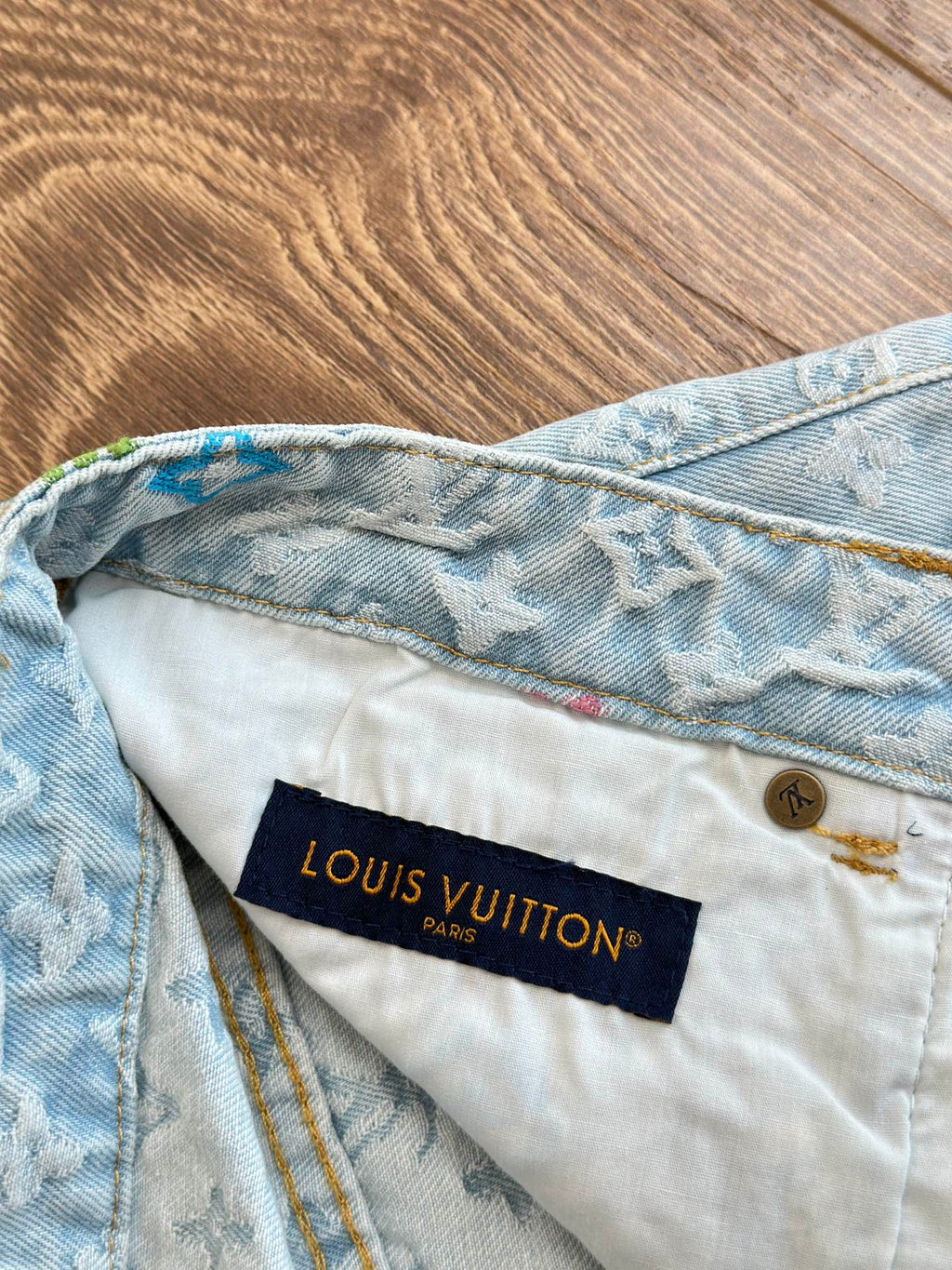 Light blue monogram denim shorts with dark blue Louis Vuitton Paris waistband label