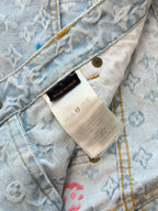 Light blue monogram denim shorts with inner care label and stitched waistband