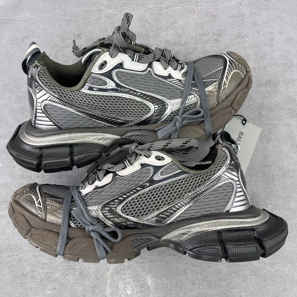 Chunky Balenciaga sneakers in gray and silver with mesh panels and lace-up front