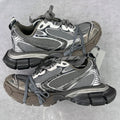 Chunky Balenciaga sneakers in gray and silver with mesh panels and lace-up front
