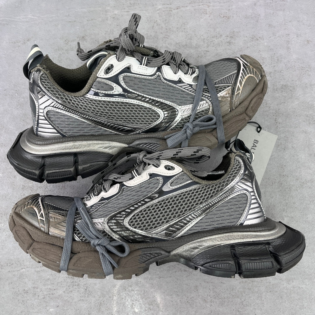 Chunky Balenciaga sneakers in gray and silver with mesh panels and lace-up front
