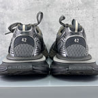 Back view sneakers with gray mesh uppers, black soles, and size marking '42'