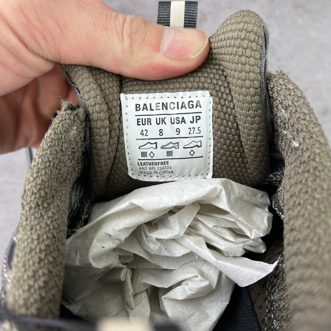 Shoe interior label with size '42' and care text on gray fabric lining