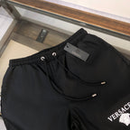 Black Versace shorts elastic waistband drawstring and white logo thigh