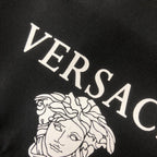 Versace logo print on black fabric
