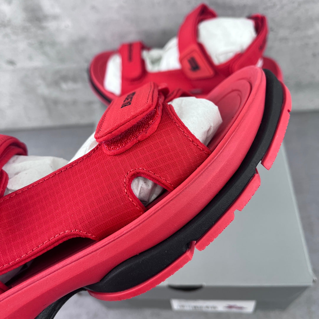 Red Balenciaga slip-on sandal with textured upper and padded hook-loop strap