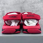 Red Balenciaga sandals with branded straps and textured rubber sole