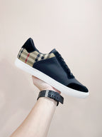 Navy sneakers with check-pattern tongue and lace-up front, white sole