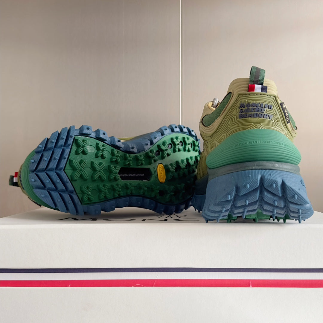Moncler sneakers with green outsole tread and blue rubber sole, heel and side view