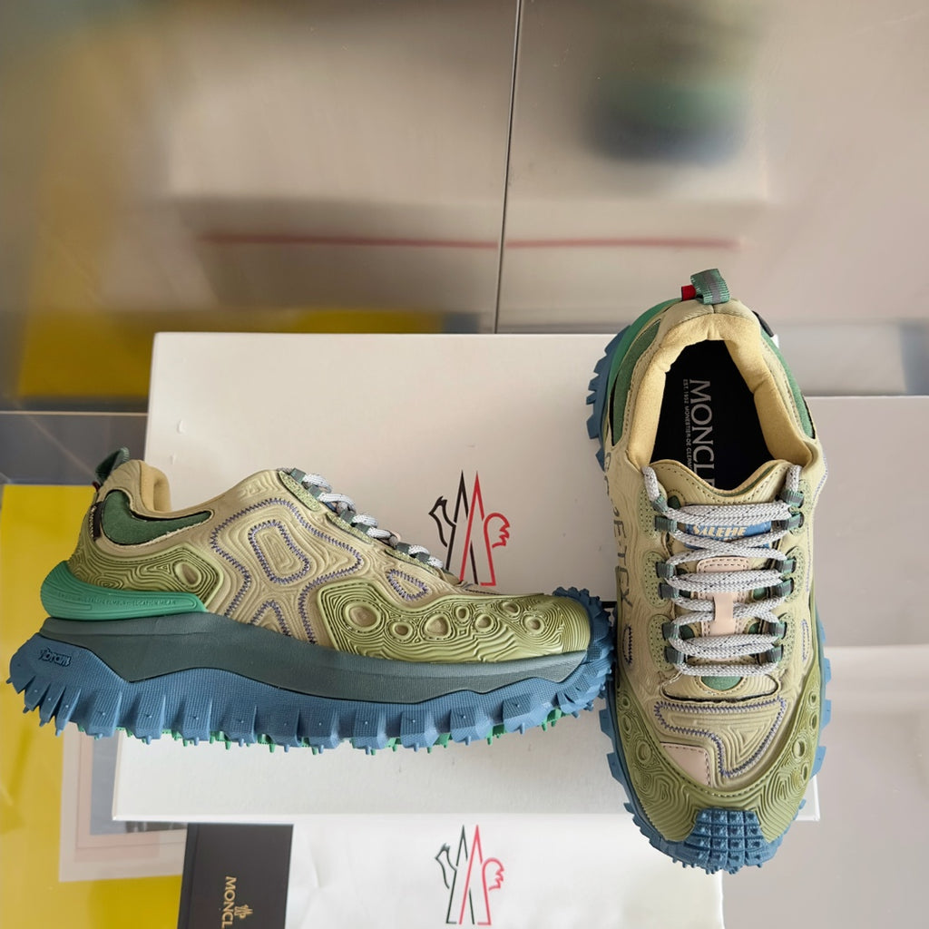 Moncler lace-up sneakers, olive upper with green heel and blue tread sole, side view