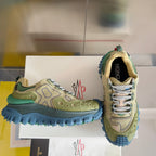 Moncler lace-up sneakers, olive upper with green heel and blue tread sole, side view