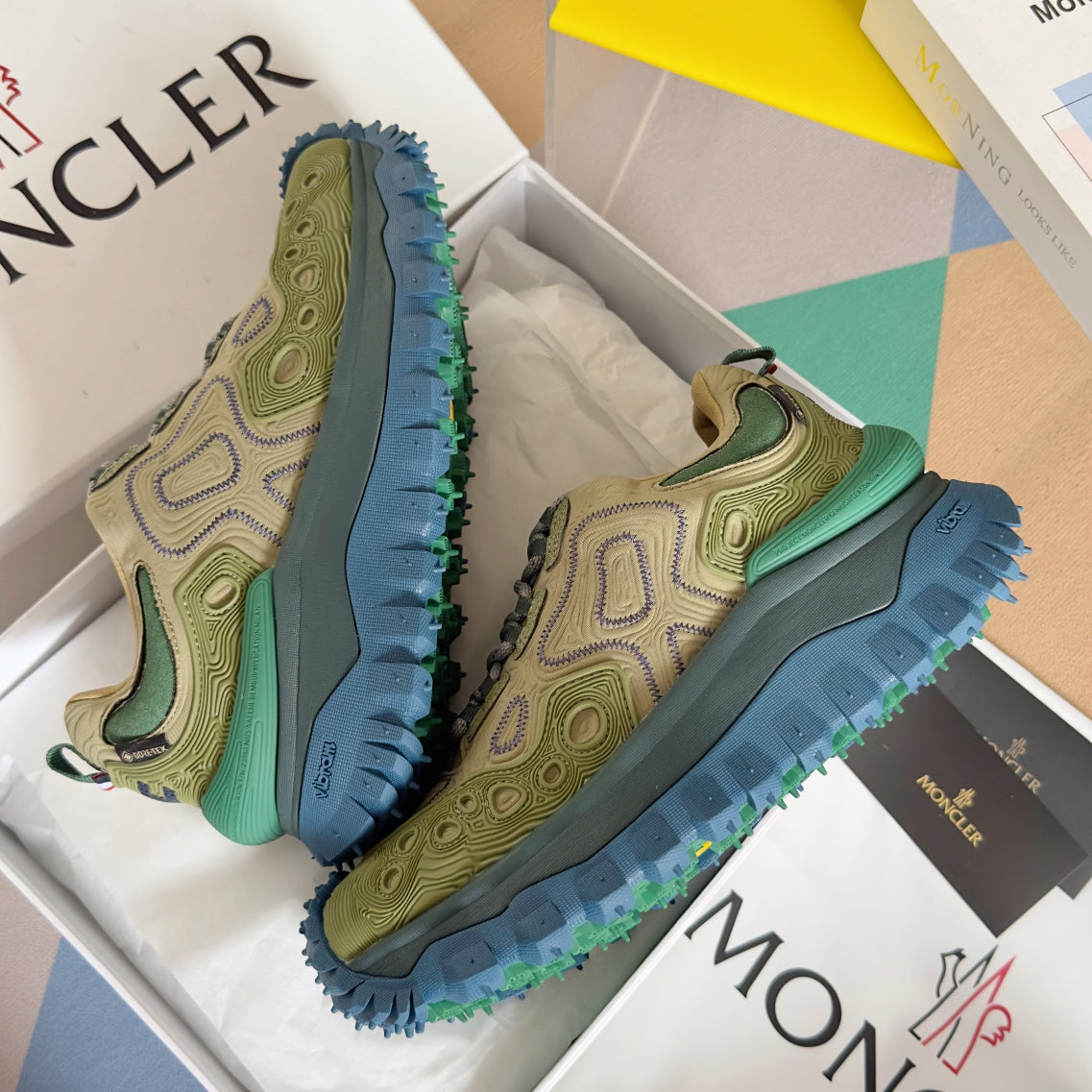 Moncler lace-up sneakers, olive uppers with green trim and blue spiked sole, pair on box