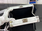 Men's Louis Vuitton bag open top, black interior with monogram exterior and studs