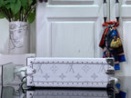 Louis Vuitton white monogram trunk bag with metal corner hardware and strap
