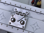 Men's Louis Vuitton bag front metal plate with studs and clasp hardware