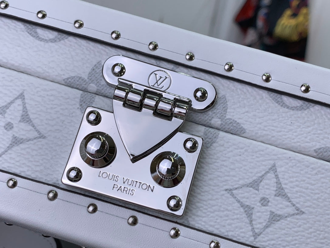 Men's Louis Vuitton bag front metal plate with studs and clasp hardware